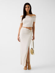 Off-shoulder draped knit top