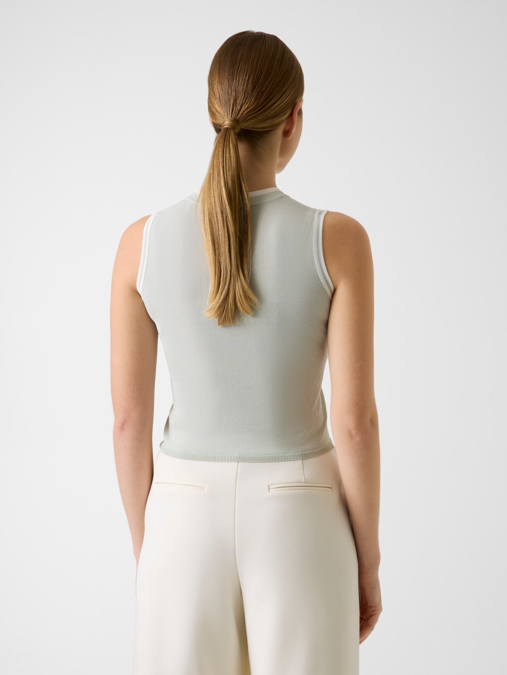 Embroidered logo knit top