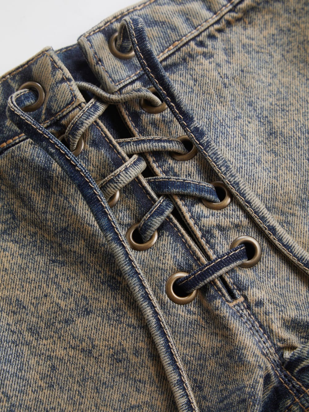 coated mini denim shorts