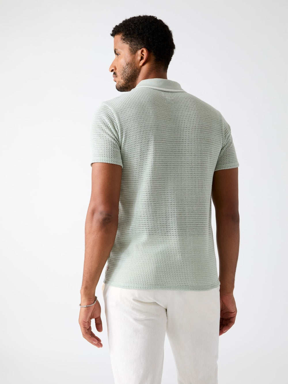 Buttonless polo shirt