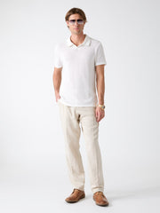 Buttonless polo shirt