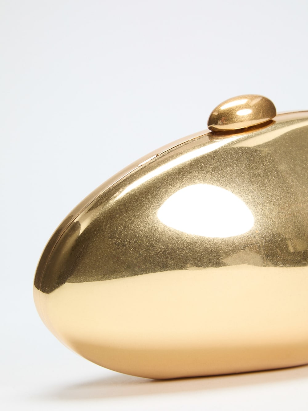 Metallic Oval Clutch