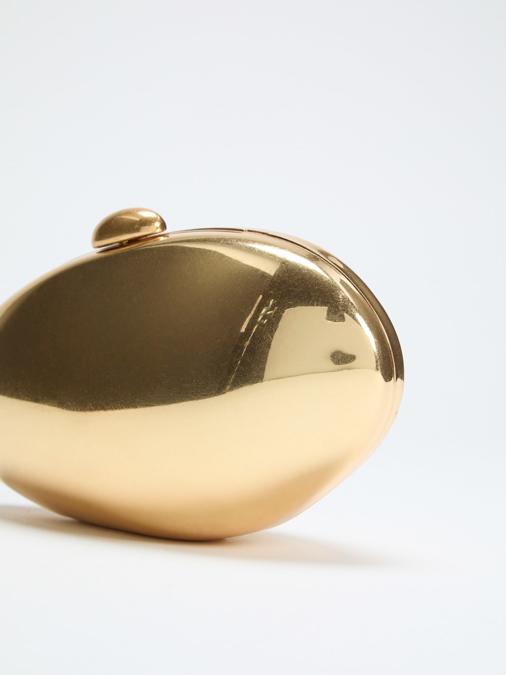 Metallic Oval Clutch